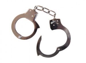 bigstock-a-pair-of-handcuffs-on-white-51541189-e1408666378847